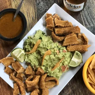 Guac and pork cracklings appetizer!! Yummmy!!