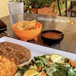 Healthy and delicious chicken breast with spinach, carrot and zucchini topped with melted cheese