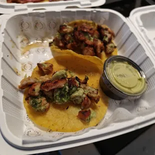 Small tacos. Meat too charred.