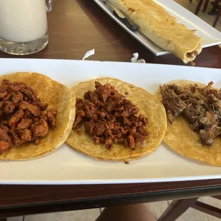Tacos 2 a pastor and one suadero.