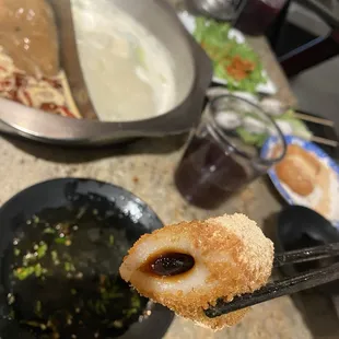 a close up of a piece of fried food