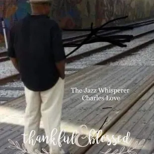 a man standing on a train track