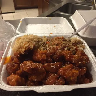 Sesame chicken and rice (I ate some before I took the picture). Very good and a good price.