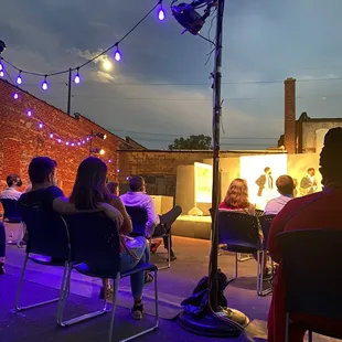 Outdoor performance behind the theatre