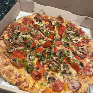 Large pizza with Pepperoni, mushroom, and green pepper and butter/Parmesan crust.