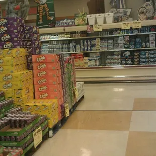 a grocery store aisle filled with drinks