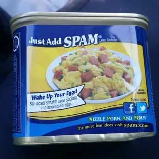 Easter Ham in a can is locked in a cabinet near  checkout. Prized much like alcohol Spam needs to be secure.