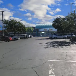 a parking lot with cars parked in it