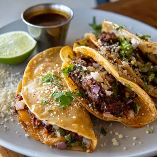 three tacos on a plate