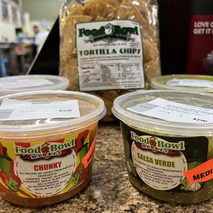 three containers of food on a counter