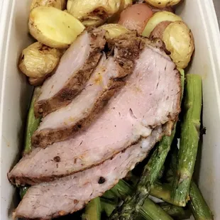 pork, asparagus, and potatoes