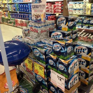 a grocery store filled with cans of beer