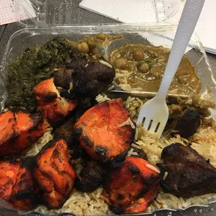 Lamb and sheesh combo with veggies (spinach and chickpeas) and rice. Pretty good. Lamb was the best part