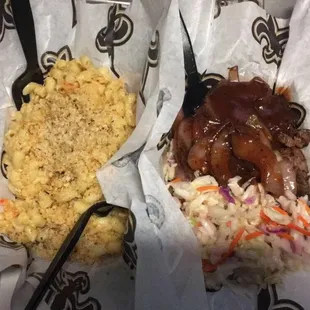 Crawfish mac and cheese, brisket, and coleslaw