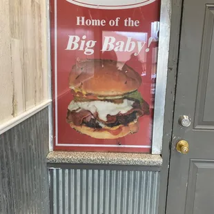 a sign for a big baby sandwich