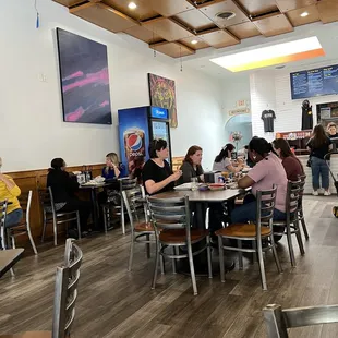 people sitting at tables