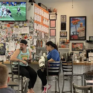 Dogs allowed inside and on the counter where you eat and drink.  I captured the moment when the dog was jumping off the counter.