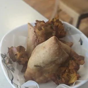 a plate of fried food on a table
