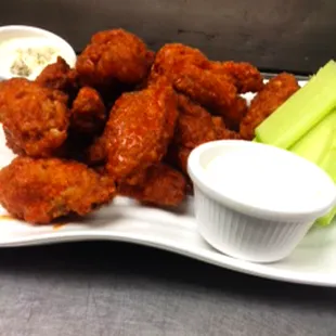 Crispy Chicken Wings - Tossed with Frank's Red Hot Sauce, blue cheese ranch on the side