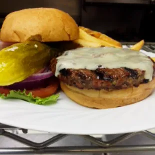 Thunderhawk Burger - A half pound of ground certified Angus Beef with your choice of cheese served with lettuce, tomato and onion