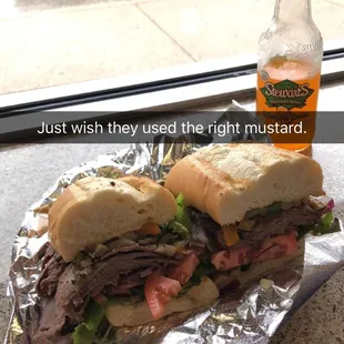 a sandwich and a bottle of beer