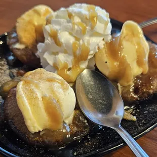 Granny Smith apple rings, sliced, cored, dipped in cinnamon sugar, deep fried, topped with vanilla ice cream, cool whip and caramel sauce