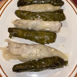 stuffed grape leaves on a plate