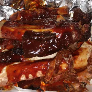 No meat on the bone and over sauced.