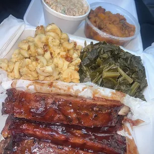 BBQ Pork Ribs 1/2 Slab , Mac and Cheese , Collard Greens , Candied Yams , Seafood Salad