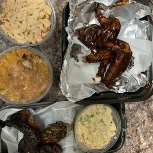 Jerk wings, best potato salad ever, bbq wings, peach cobbler, seafood salad