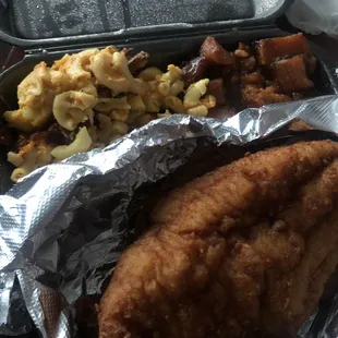 Catfish platter with mac and cheese and yams