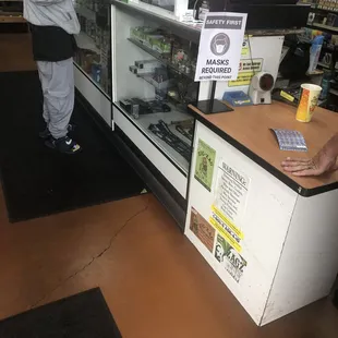 a man standing at a counter