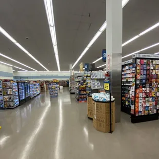 a grocery store aisle with a variety of products
