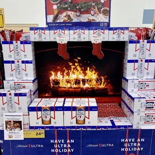 a fire place with boxes of beer