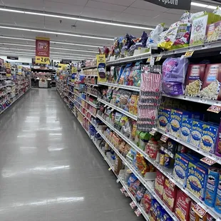 a grocery store aisle filled with snacks