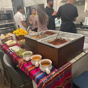 Taco Bar - Al Pastor, Chicken and Quesadillas with delicious salsas and table guacamole.