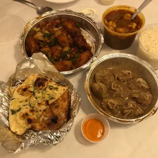 Spicy Peppered Chicken Wings, Shrimp Curry and rice, Jhol Momo