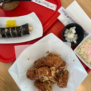 beef bulgogi kimbap roll ($11) &amp; garlic soy sauce fried chicken wings 9 pcs ($18)