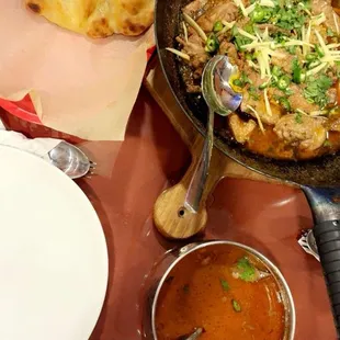 Beef nihrai, naan, and chicken karachi