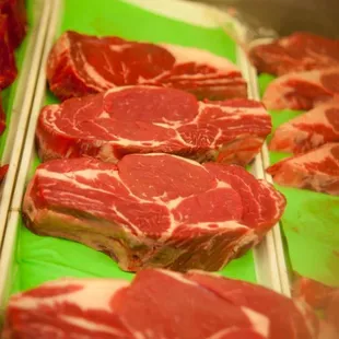a display of raw meat