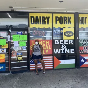 a woman standing in front of the door