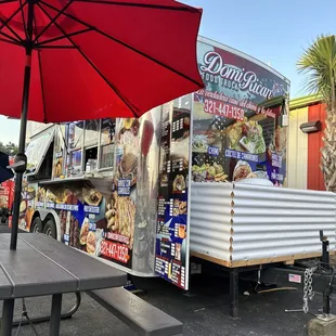 a food truck parked in a parking lot