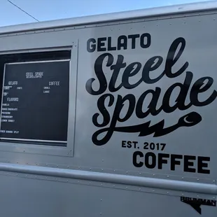 a close up of the side of a food truck