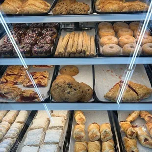 baked goods but no one behind counter to serve you!