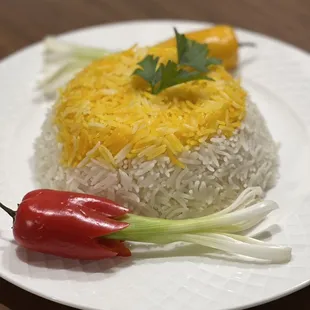 Saffron Rice ( Berenj zaferani)
Fluffy basmati rice with saffron can be served with any stews and kabobs.