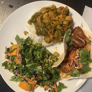 Cauliflower tacos, autumn harvest salad, and chana saag w/ roti.  All were great.