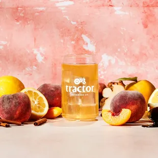 peaches, oranges, and a glass of beer