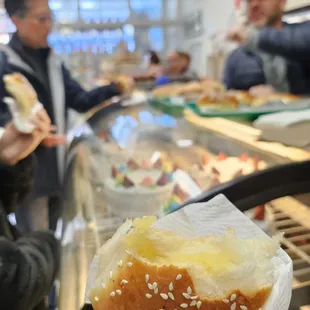 King's bakery with oozing pineapple filling inside of freshly baked hot buns