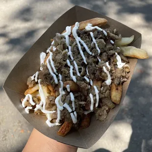 Sisig fries ($12) @ SisigCo. Tender meat but doesn't have the citrusy sisig seasoning (has adobo instead). Fries too crispy for fork.
