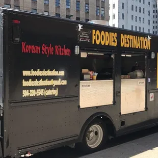 a food truck parked on the side of the road